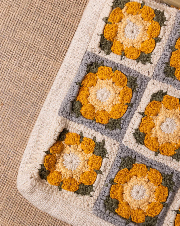 Daisy Dream crochet bag, handmade eco-friendly tote by The Mango House Trust