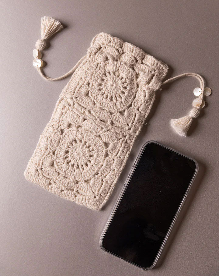 Handcrafted crochet pouch, unique eco-friendly accessory by The Mango House Trust