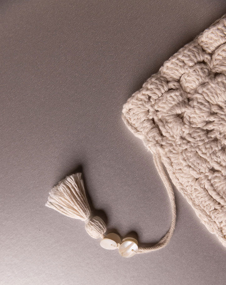 Handcrafted crochet pouch, unique eco-friendly accessory by The Mango House Trust