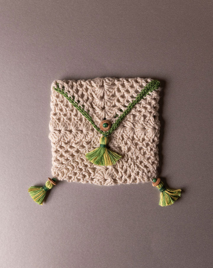 Handcrafted crochet pouch, eco-friendly artisan accessory by The Mango House Trust