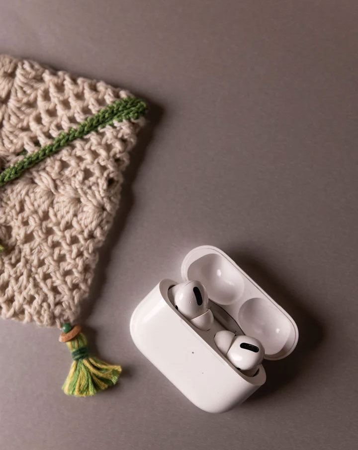 Handcrafted crochet pouch, eco-friendly artisan accessory by The Mango House Trust