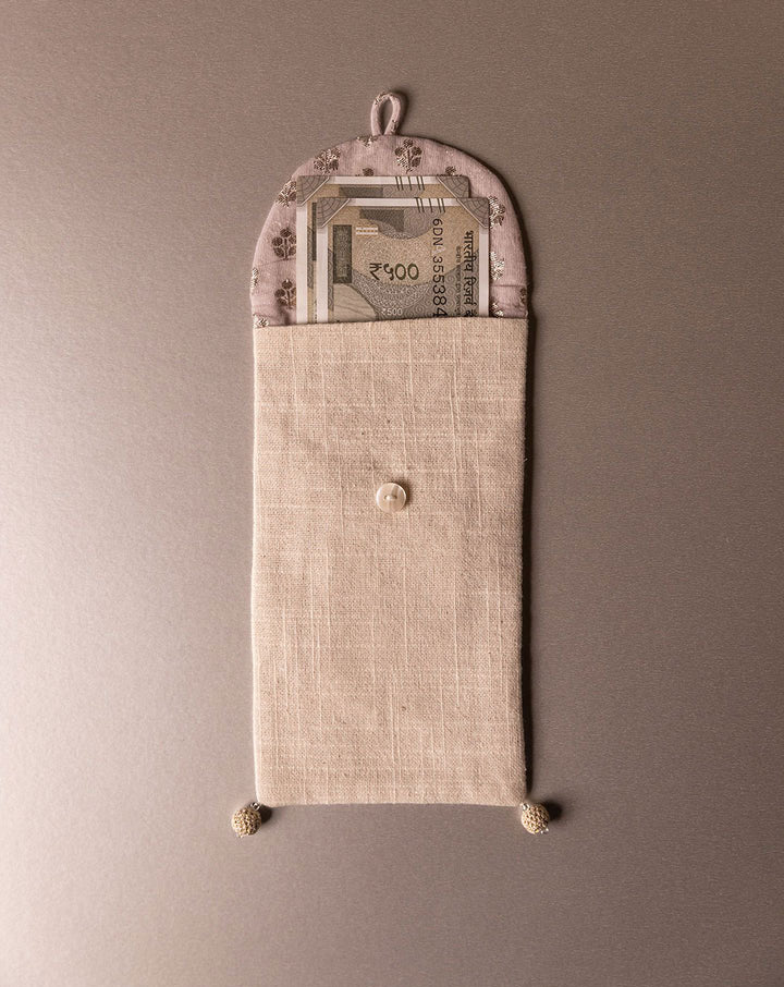 Elegant handcrafted crochet pouch, eco-friendly design by The Mango House Trust