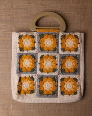 Daisy Dream crochet bag, handmade eco-friendly tote by The Mango House Trust