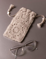 Handcrafted crochet pouch, unique eco-friendly accessory by The Mango House Trust