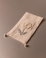 Elegant handcrafted crochet pouch, eco-friendly design by The Mango House Trust