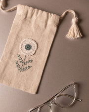 Chic handmade crochet pouch, sustainable everyday accessory by The Mango House Trust