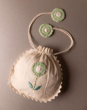 Eco-friendly crochet pouch, handmade sustainable accessory by The Mango House Trust